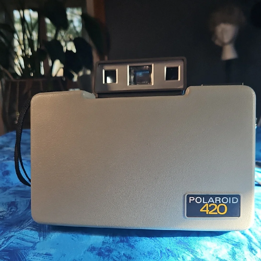 Polaroid Box with Navy Blue and Yellow Lettering